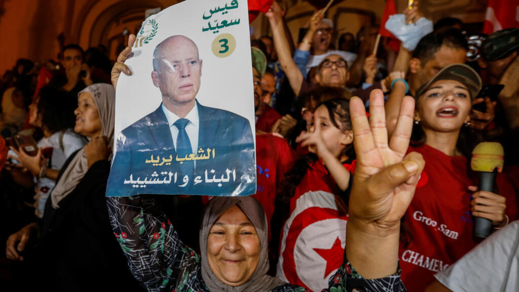 Tunisia's Kais Saied poised for landslide election victory amid crackdown on opposition